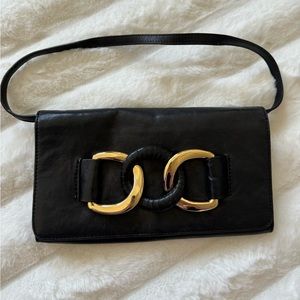 Michael kors black leather clutch with gold rings